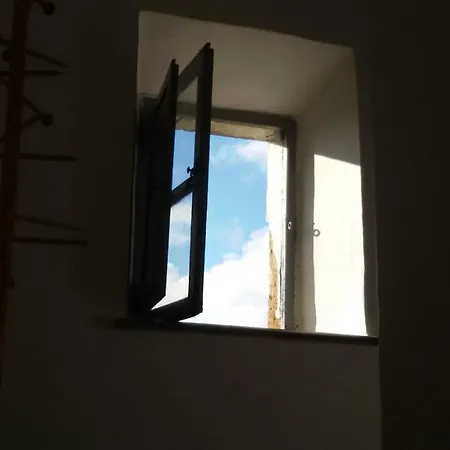 Rosso Di Sera's House *